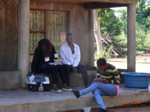 Health care workers visit households in Southern Mozambique to identify men infected with the malaria parasite but presenting no symptoms. Image/Beatriz Galatas
