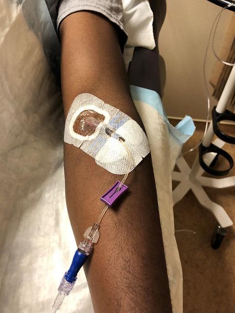 A healthy volunteer receives an intravenous infusion of mAb114--an experimental treatment for Ebola virus disease--in a Phase 1 clinical trial held at the NIH Clinical Center in Bethesda, Md. Image/NIAID
